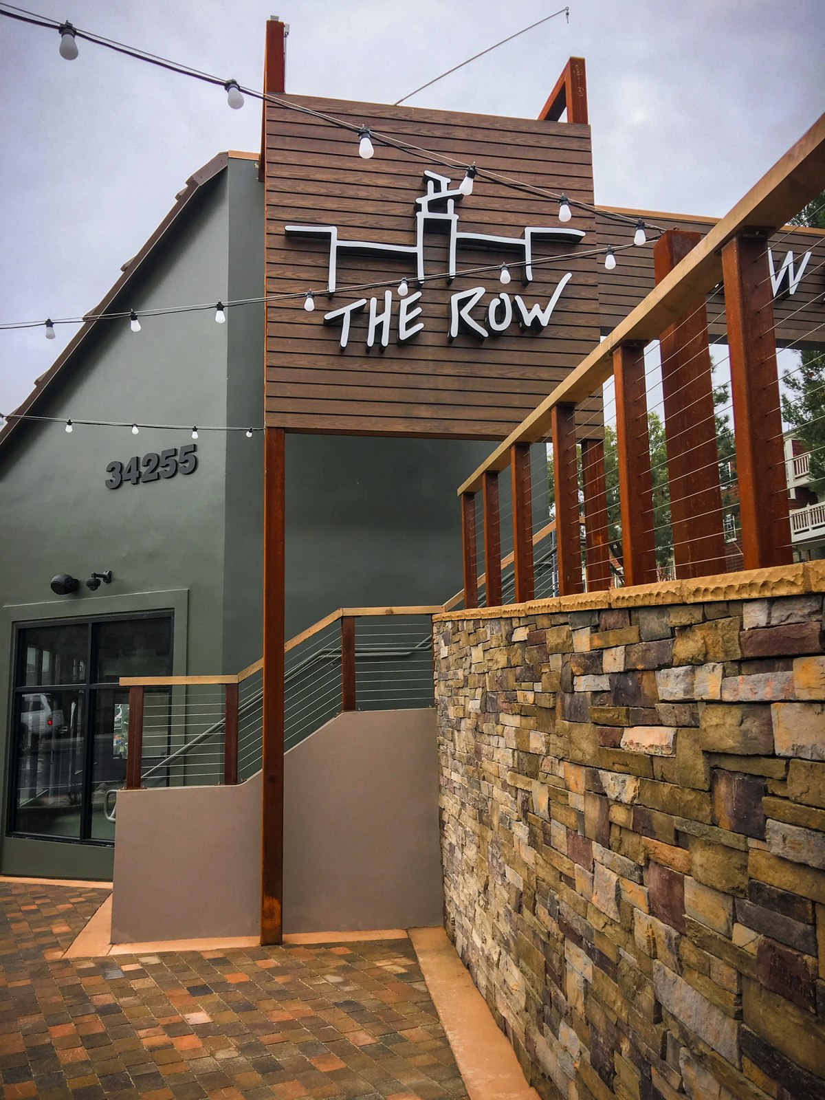 The Row entry signage and stair from Pacific Coast Highway